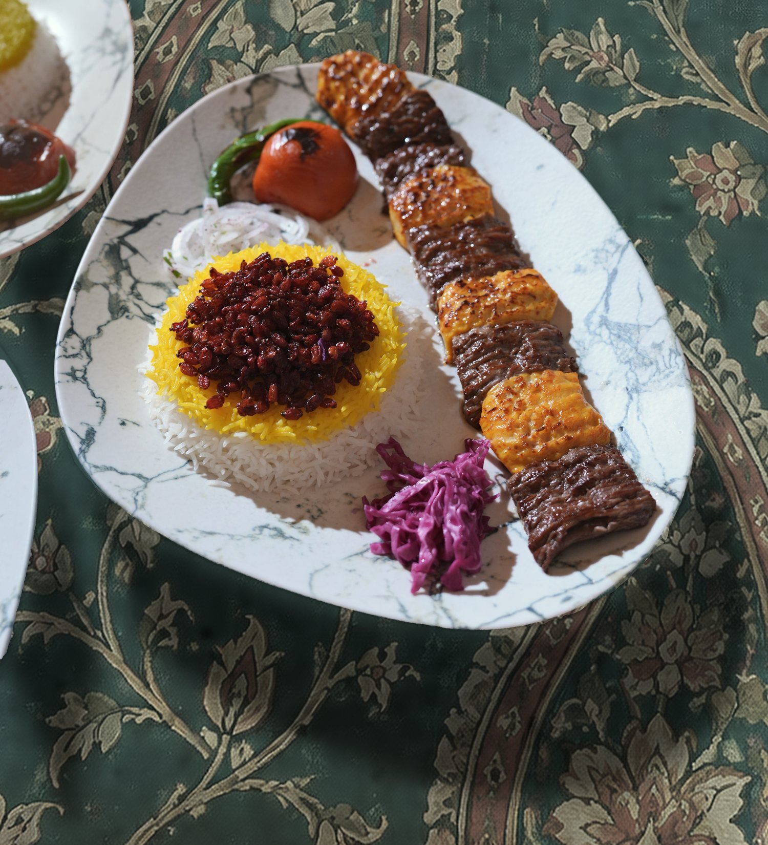 Bakhtiari Kebab with barberry rice on green termeh